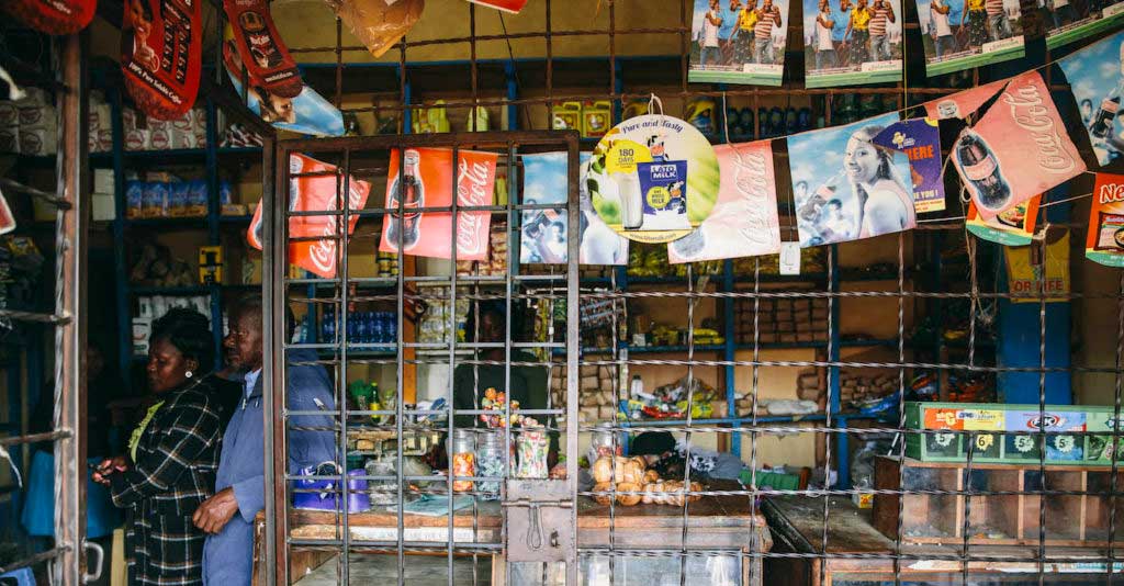 A distribution network of kiosks can sell mobile phone airtime and data as physical inventory (prepaid scratch cards)